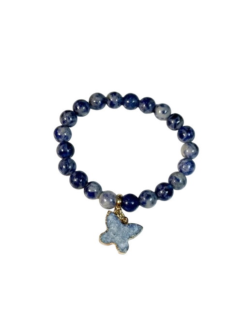 Blue beaded bracelet with a butterfly charm on a white background