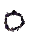 Purple beaded bracelet on a white background