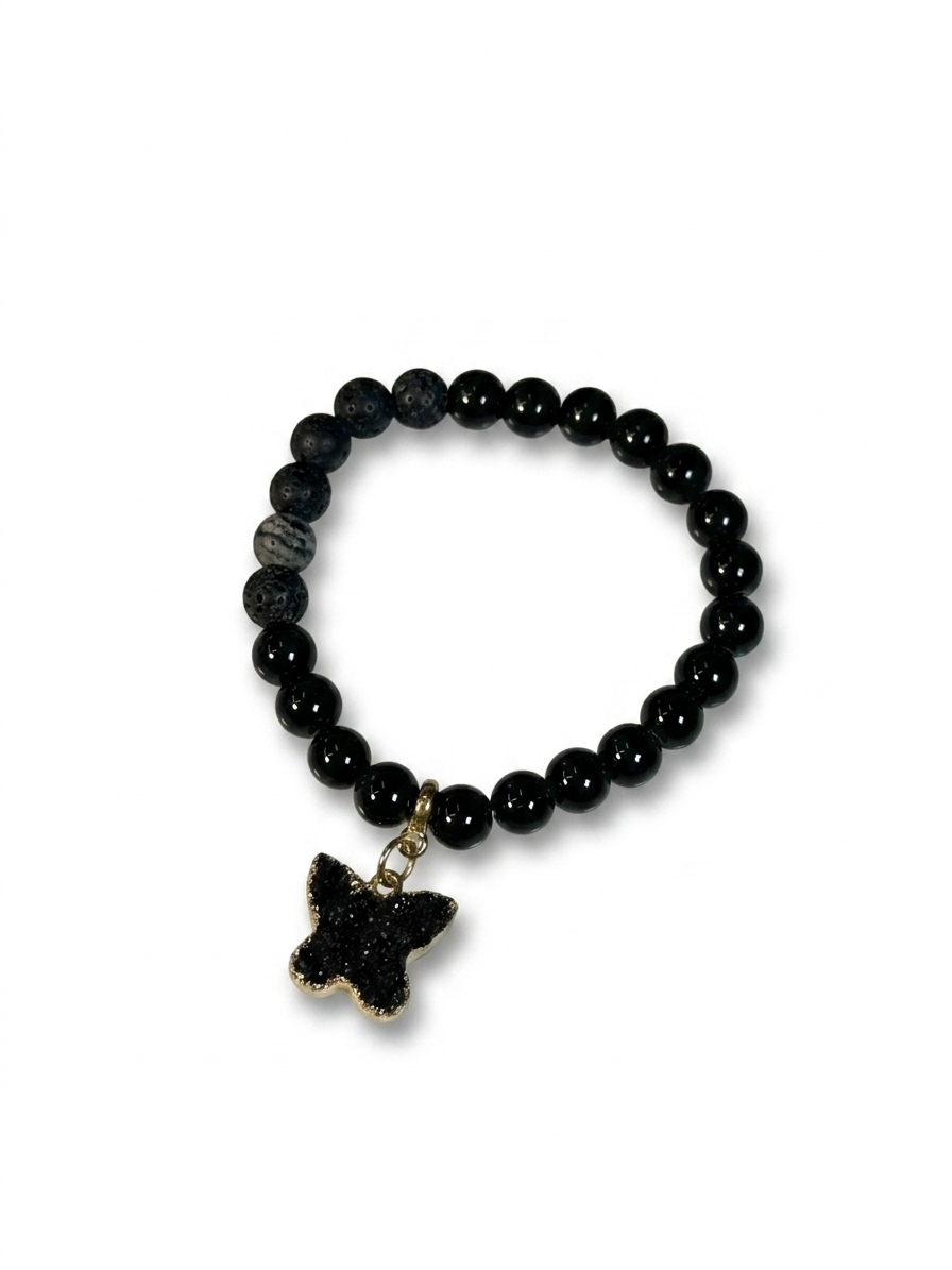 Black beaded bracelet with a star-shaped charm on a white background