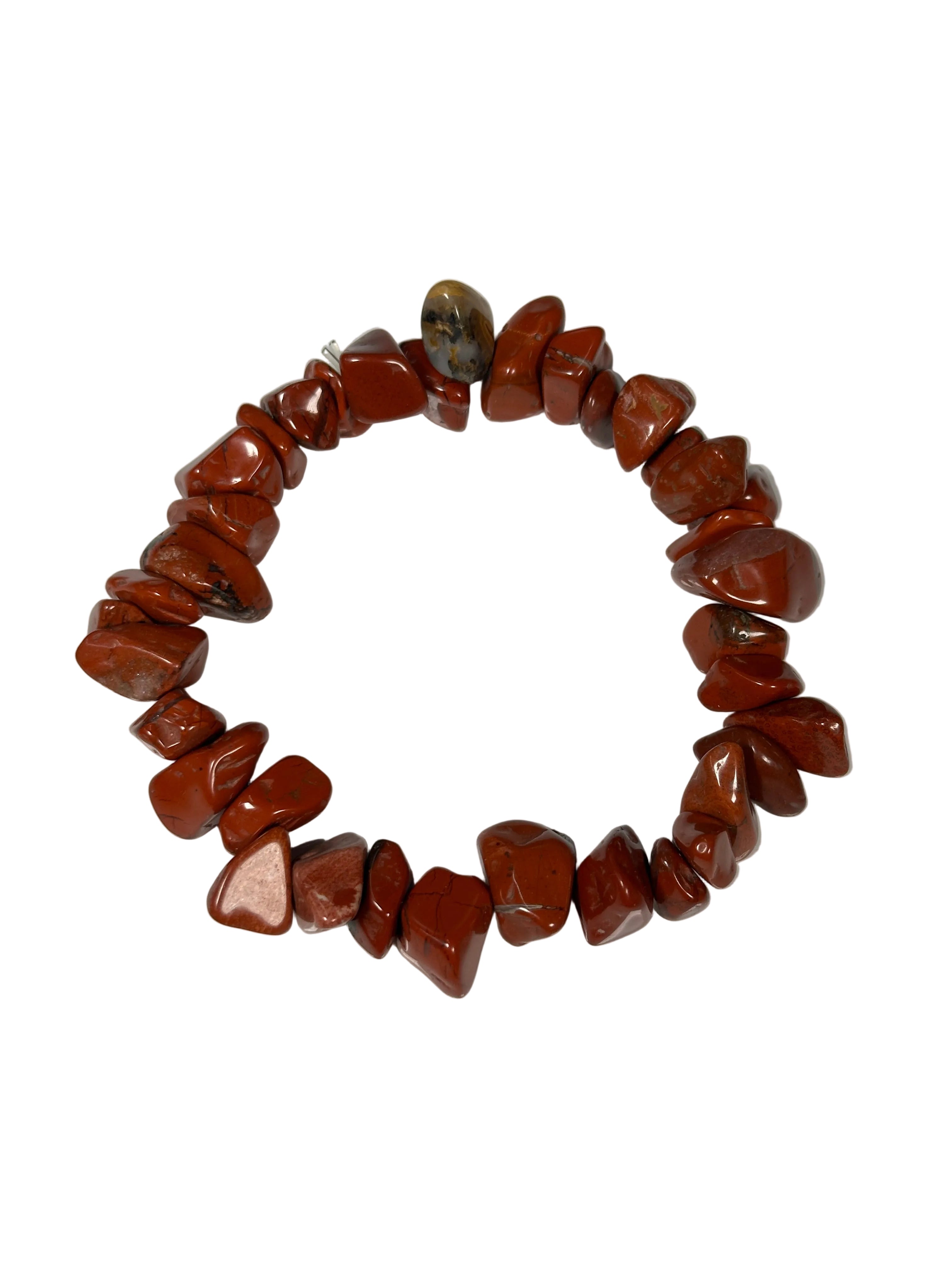 Bracelet made of brown stone beads on a white background